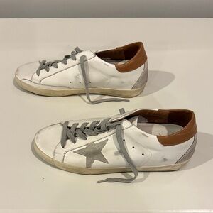 Women’s Golden Goose Superstar sneakers-white with brown leather detail.